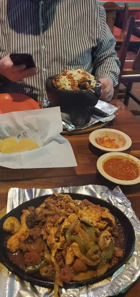 Molcajete Fajitas on the Top Tera Sur Fajitas on Bottom